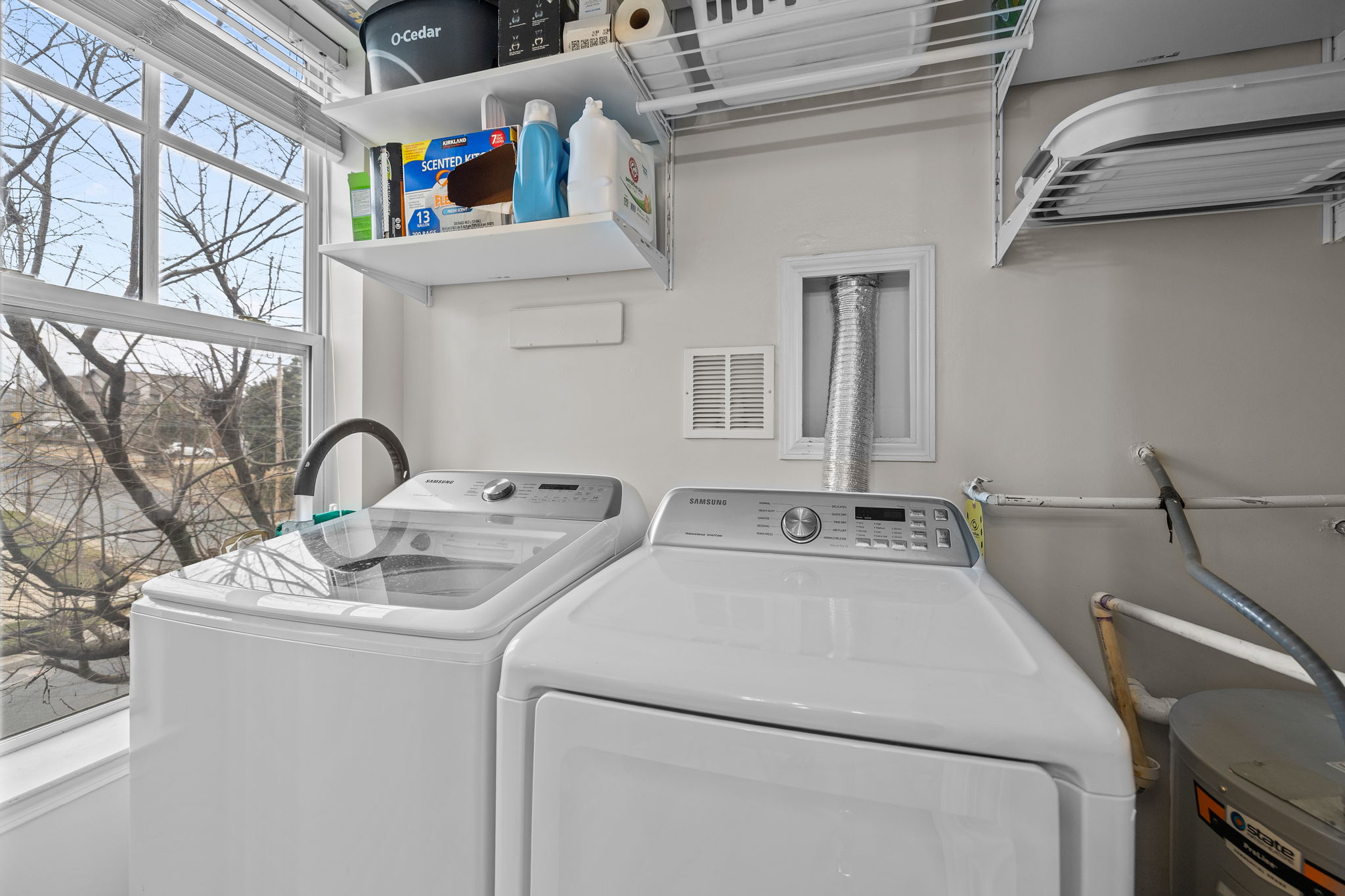 Laundry room with full-size washer and dryer