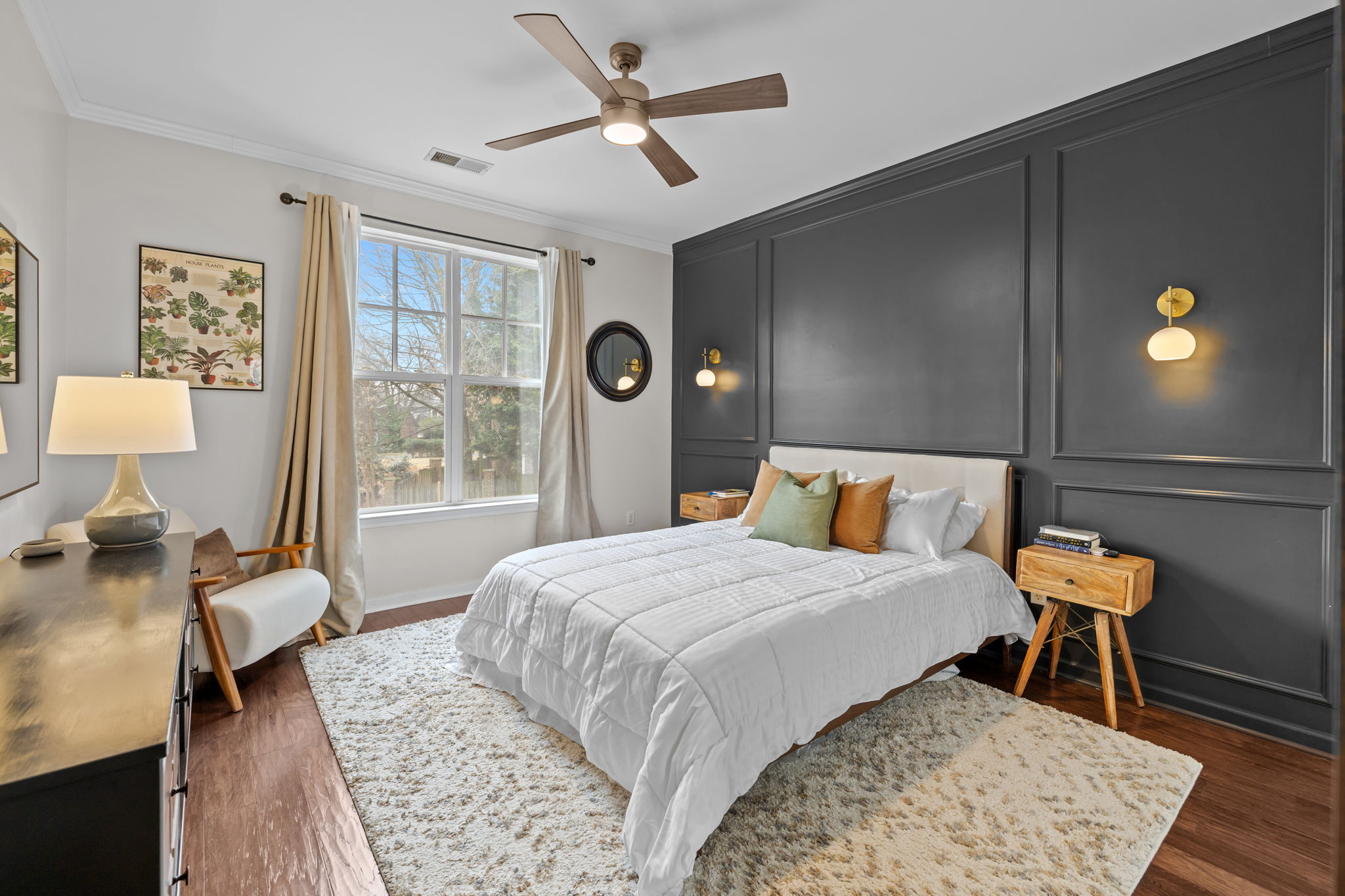 Primary bedroom with custom accent wall